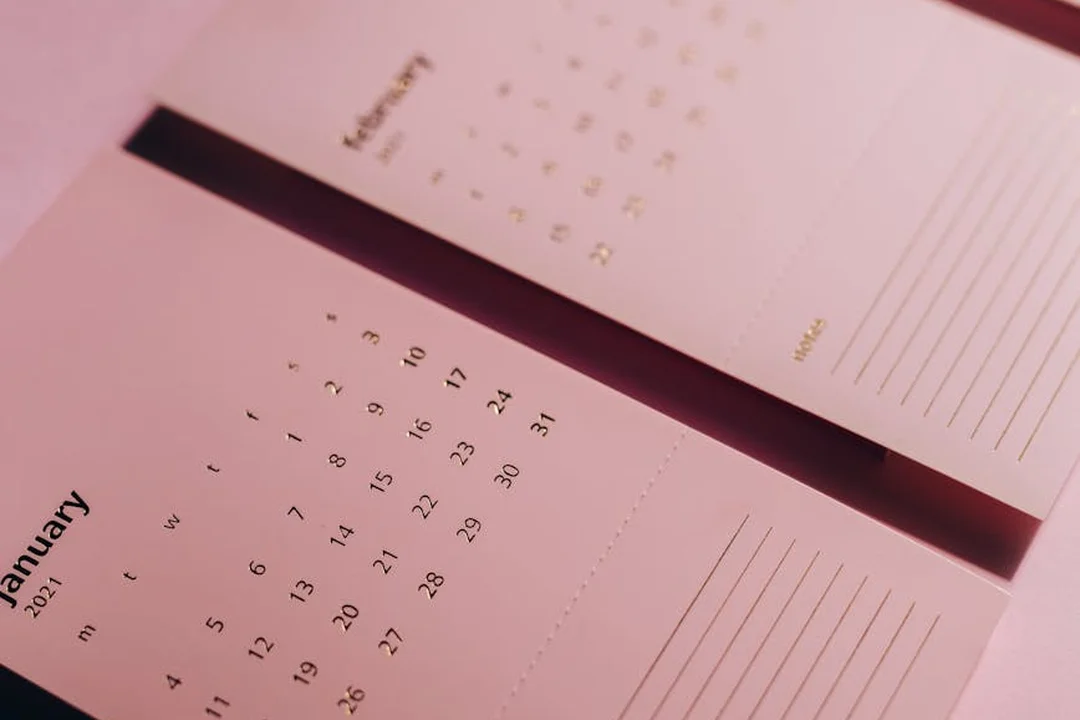 Open calendar planner displaying January dates, symbolizing tracking deadlines for HOA covenants expiration across states.