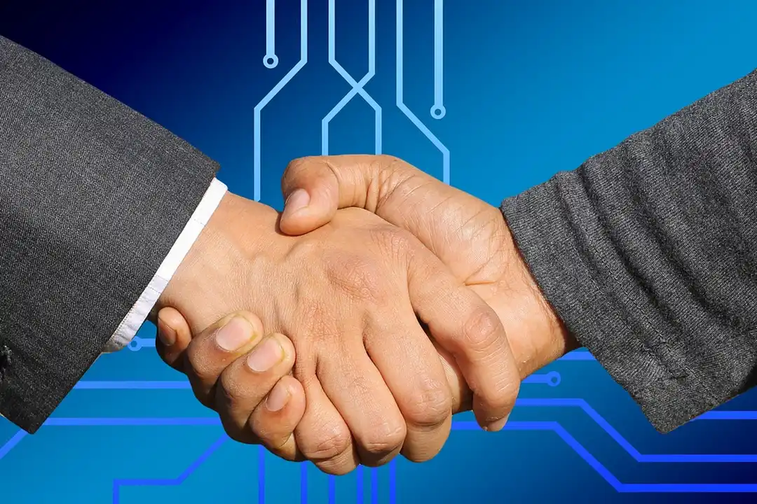 Two hands in a handshake against a blue circuitry background, symbolizing the transition from developer control to homeowner-led management.
