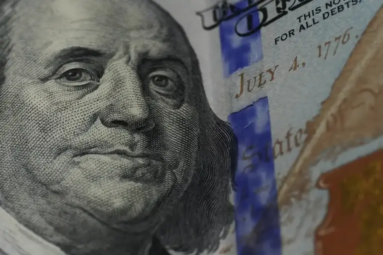 Close-up of Benjamin Franklin's face on a U.S. dollar bill