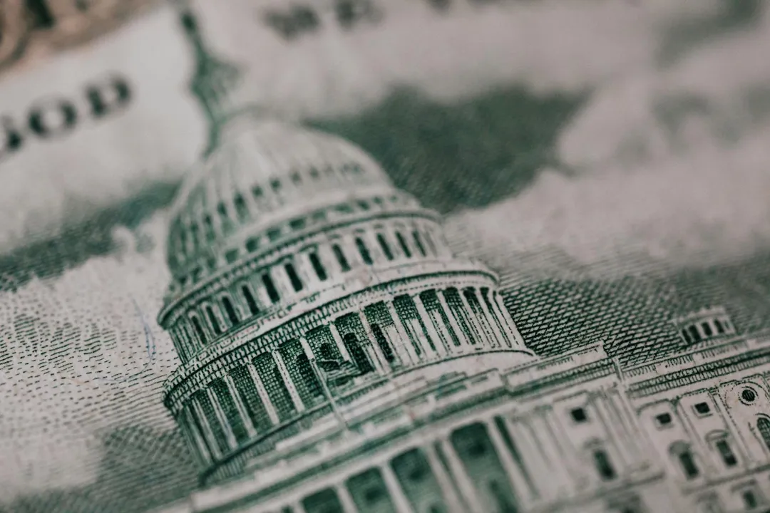 Close-up of a U.S. dollar bill featuring the Capitol building, symbolizing the financial considerations of HOA fees.