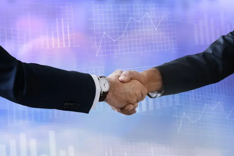 Two professionals shaking hands against a backdrop of charts, representing agreement and governance in an HOA community