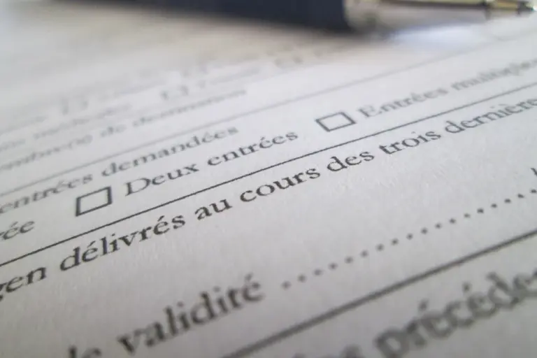 Close-up of a printed form with checkboxes and small, dense text.