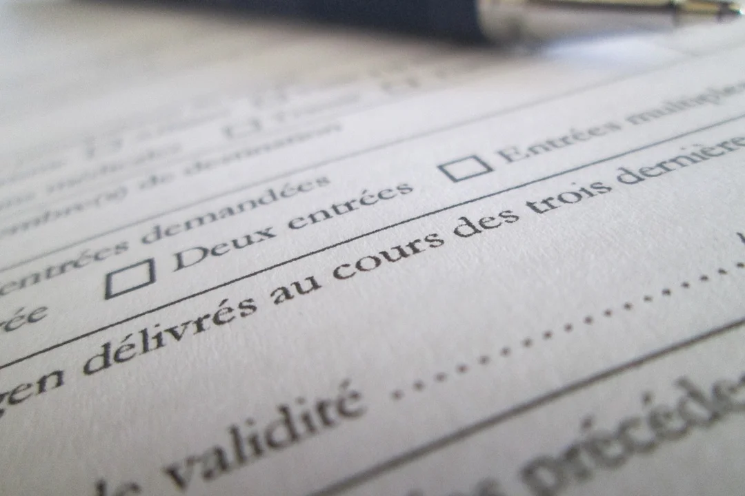 Close-up of a printed form with checkboxes and small, dense text.